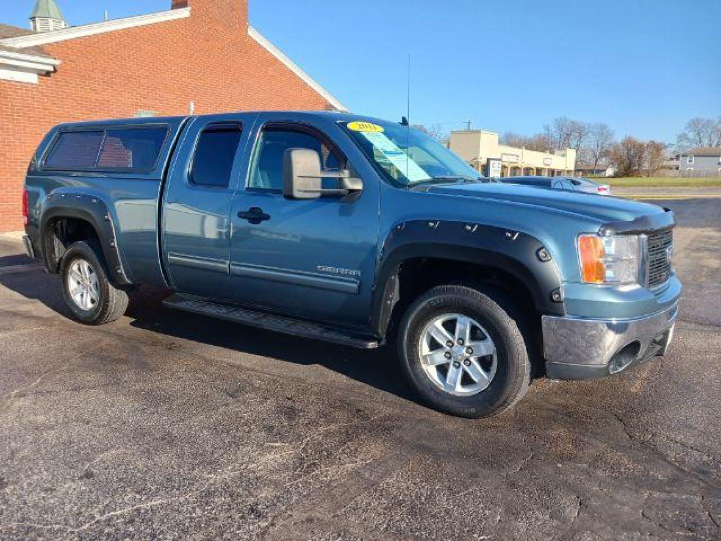 2011 Midnight Blue Metallic GMC Sierra 1500 SLE Ext. Cab 4WD (1GTR2VE32BZ) with an 5.3L V8 OHV 16V FFV engine, 6-Speed Automatic transmission, located at 1951 S Dayton Lakeview Rd., New Carlisle, OH, 45344, (937) 908-9800, 39.890999, -84.050255 - Photo#0