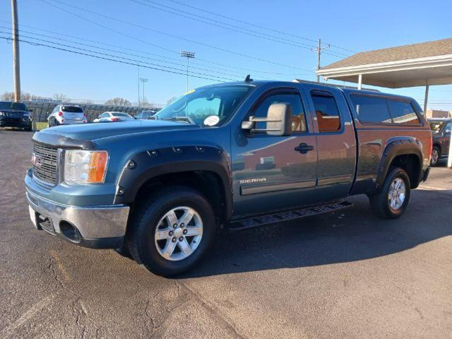 2011 Midnight Blue Metallic GMC Sierra 1500 SLE Ext. Cab 4WD (1GTR2VE32BZ) with an 5.3L V8 OHV 16V FFV engine, 6-Speed Automatic transmission, located at 1951 S Dayton Lakeview Rd., New Carlisle, OH, 45344, (937) 908-9800, 39.890999, -84.050255 - Photo#2