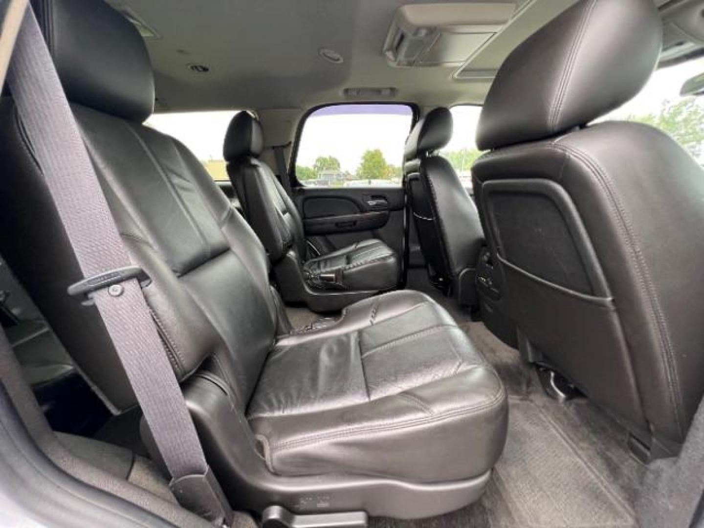 2011 Pure Silver Metallic GMC Yukon SLT1 4WD (1GKS2CE0XBR) with an 5.3L V8 OHV 16V FFV engine, 6-Speed Automatic transmission, located at 401 Woodman Dr, Riverside, OH, 45431, (937) 908-9800, 39.763779, -84.122063 - Third Row - Photo#9