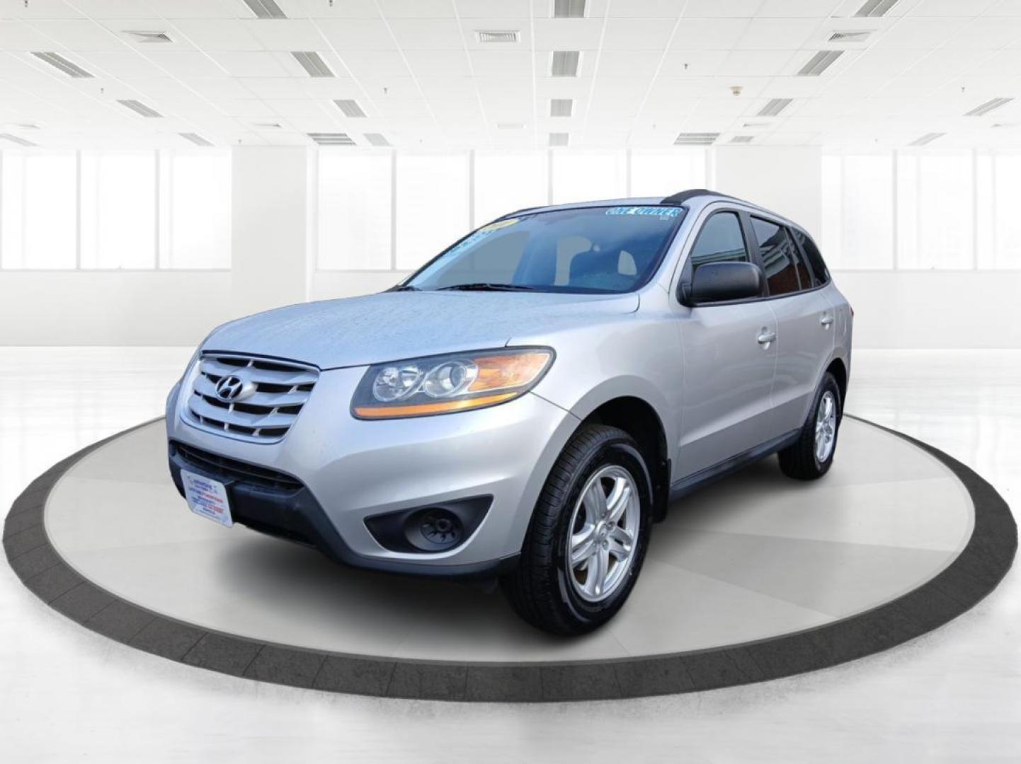 2011 Moonstone Silver Hyundai Santa Fe GL 2.4 4WD (5XYZGDAB1BG) with an 2.4L L4 DOHC 16V engine, 6-Speed Automatic transmission, located at 1184 Kauffman Ave, Fairborn, OH, 45324, (937) 908-9800, 39.807365, -84.029114 - Photo#7