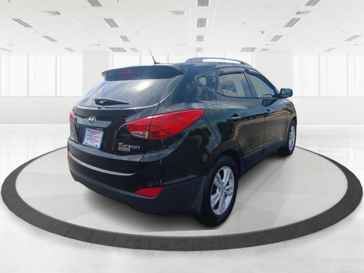 2011 Ash Black Mica Hyundai Tucson (KM8JU3AC8BU) with an 2.4L L4 DOHC 16V engine, 6-Speed Automatic transmission, located at 1184 Kauffman Ave, Fairborn, OH, 45324, (937) 908-9800, 39.807365, -84.029114 - Photo#2