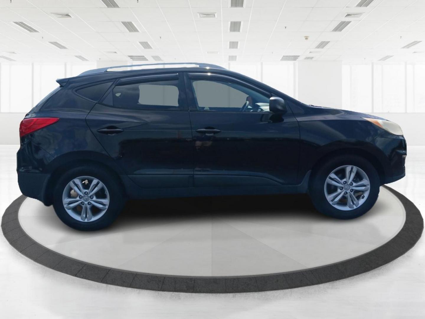 2011 Ash Black Mica Hyundai Tucson (KM8JU3AC8BU) with an 2.4L L4 DOHC 16V engine, 6-Speed Automatic transmission, located at 1184 Kauffman Ave, Fairborn, OH, 45324, (937) 908-9800, 39.807365, -84.029114 - Photo#1