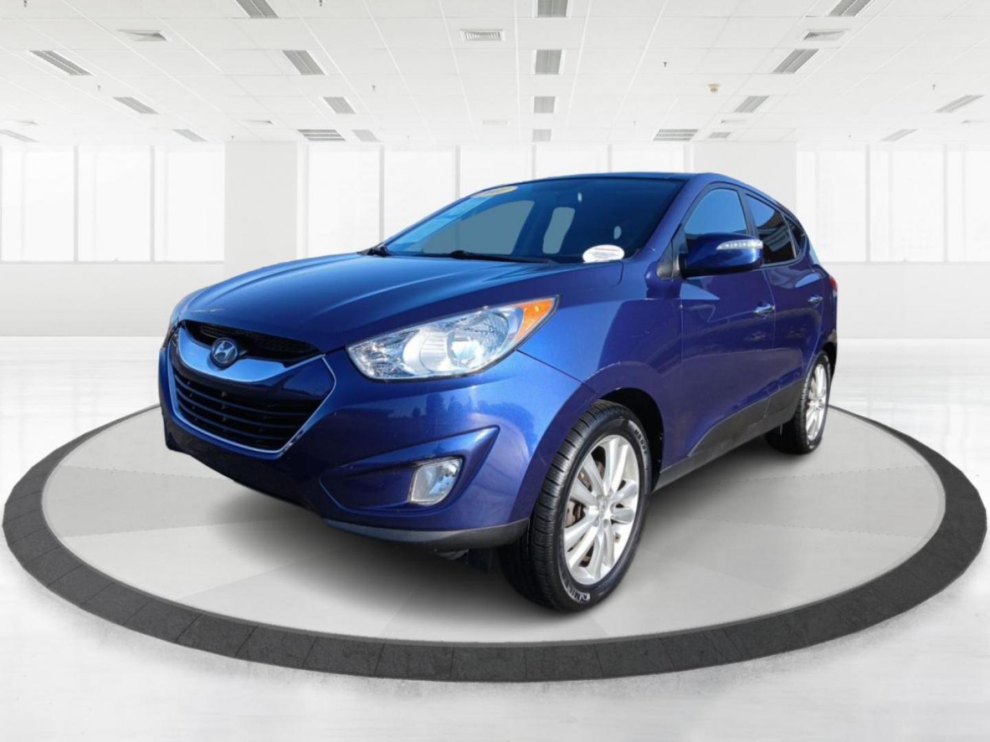 2011 Aurora Blue Metallic Hyundai Tucson (KM8JUCAC1BU) with an 2.4L L4 DOHC 16V engine, 6-Speed Automatic transmission, located at 1230 East Main St, Xenia, OH, 45385, (937) 908-9800, 39.687321, -83.910294 - Photo#7