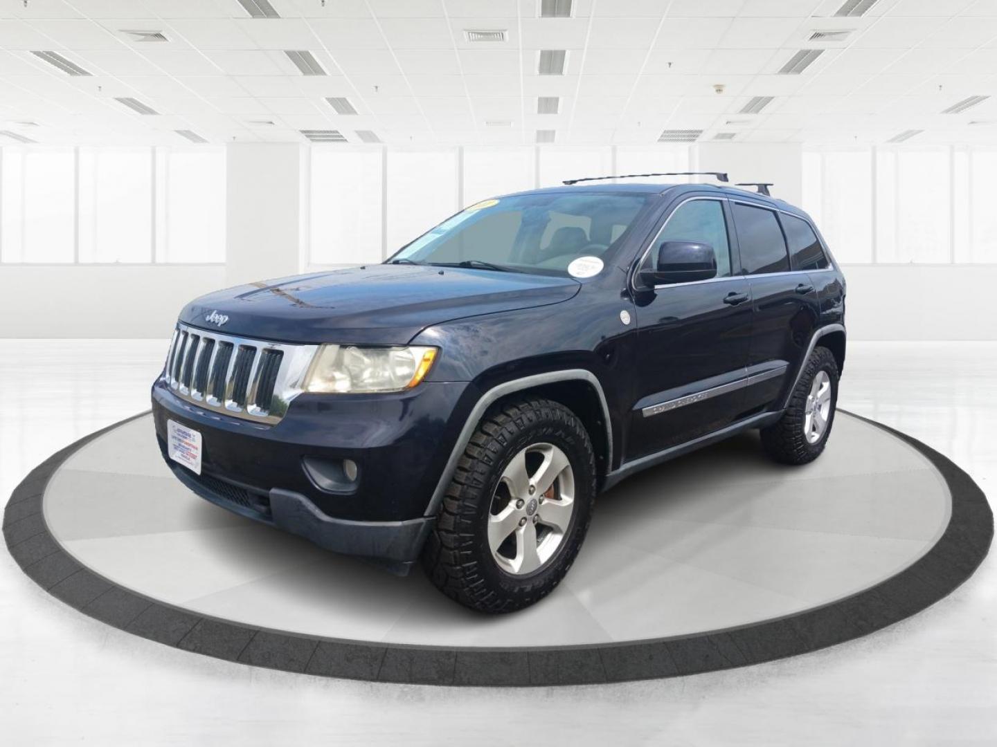 2011 Blue Jeep Grand Cherokee (1J4RR4GT1BC) with an 5.7L V8 OHV 16V engine, 5-Speed Automatic transmission, located at 1951 S Dayton Lakeview Rd., New Carlisle, OH, 45344, (937) 908-9800, 39.890999, -84.050255 - Photo#7