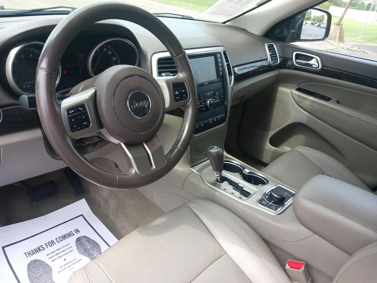 2011 Blue Jeep Grand Cherokee (1J4RR4GT1BC) with an 5.7L V8 OHV 16V engine, 5-Speed Automatic transmission, located at 1951 S Dayton Lakeview Rd., New Carlisle, OH, 45344, (937) 908-9800, 39.890999, -84.050255 - Photo#8