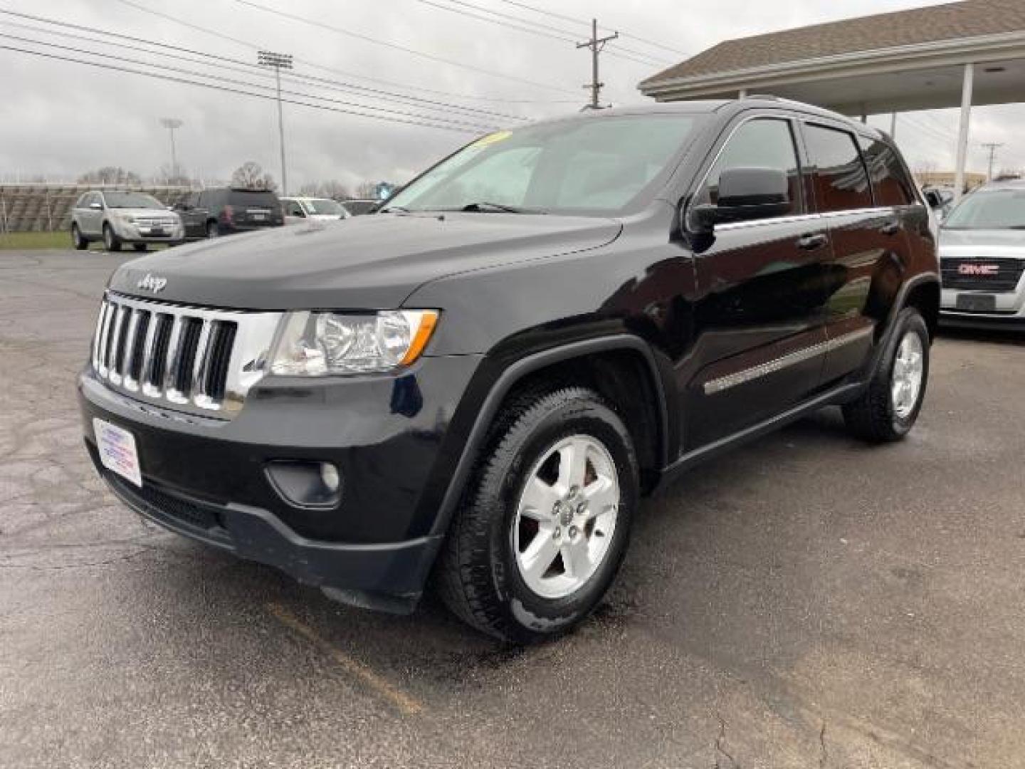 2011 Brilliant Black Crystal Pearl Jeep Grand Cherokee Laredo 4WD (1J4RR4GG4BC) with an 3.6L V6 DOHC 24V engine, 5-Speed Automatic transmission, located at 4508 South Dixie Dr, Moraine, OH, 45439, (937) 908-9800, 39.690136, -84.216438 - Photo#1