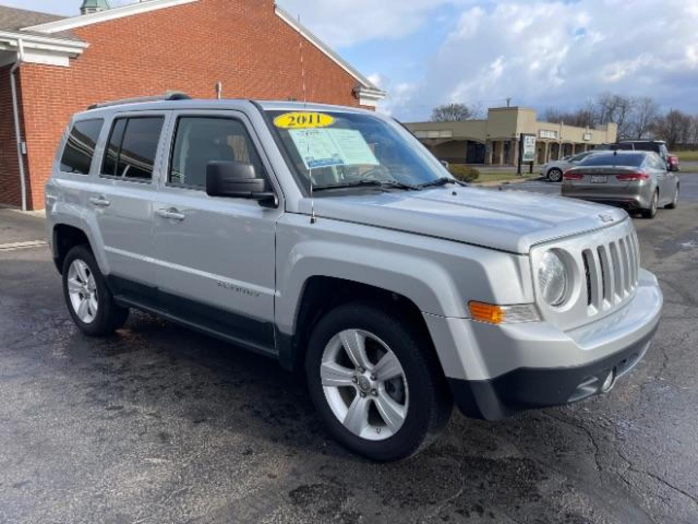 2011 Bright Silver Metallic Jeep Patriot Latitude X 4WD (1J4NF4GB8BD) with an 2.4L L4 DOHC 16V engine, located at 1184 Kauffman Ave, Fairborn, OH, 45324, (937) 908-9800, 39.807365, -84.029114 - Photo#0