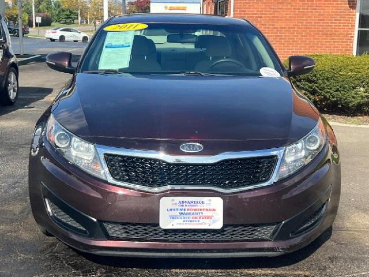 2011 Dark Cherry Kia Optima LX AT (KNAGM4A72B5) with an 2.4L L4 DOHC 16V engine, 6-Speed Automatic transmission, located at 1099 N County Rd 25A, OH, 45373, (937) 908-9800, 40.057079, -84.212883 - Photo#2