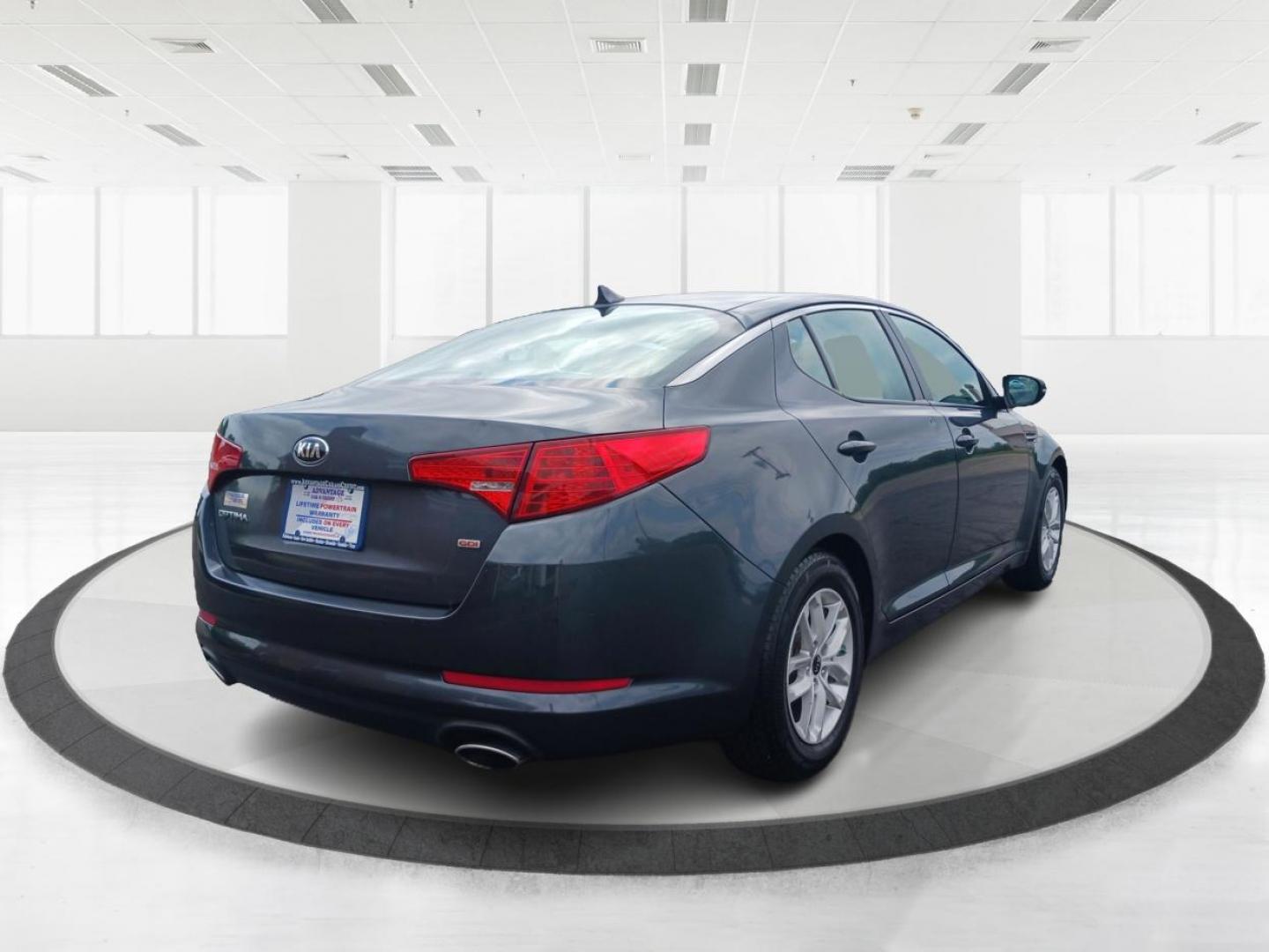 2011 Satin Metal Kia Optima LX AT (KNAGM4A7XB5) with an 2.4L L4 DOHC 16V engine, 6-Speed Automatic transmission, located at 1184 Kauffman Ave, Fairborn, OH, 45324, (937) 908-9800, 39.807365, -84.029114 - Photo#2