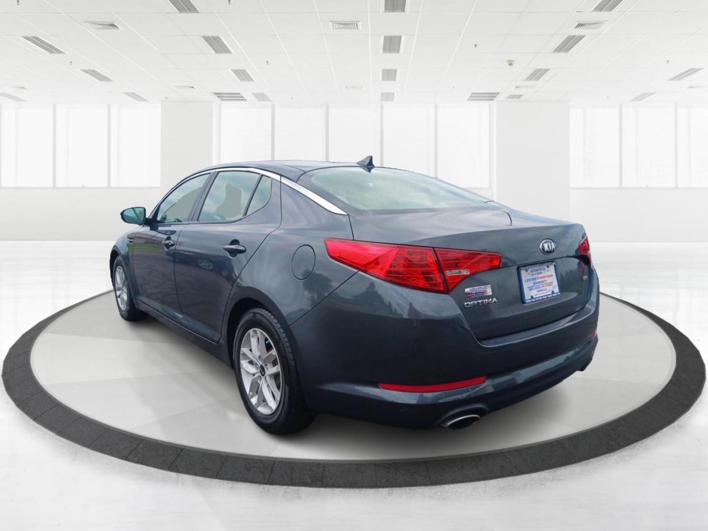 2011 Satin Metal Kia Optima LX AT (KNAGM4A7XB5) with an 2.4L L4 DOHC 16V engine, 6-Speed Automatic transmission, located at 1184 Kauffman Ave, Fairborn, OH, 45324, (937) 908-9800, 39.807365, -84.029114 - Photo#4