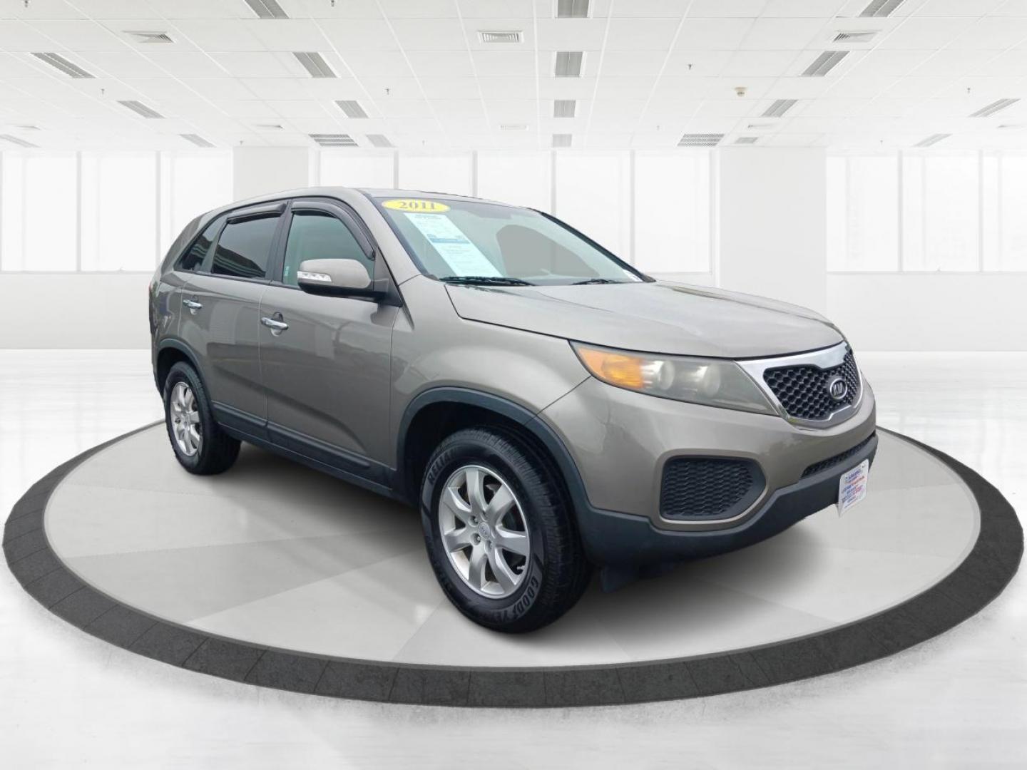 2011 Titanium Silver Kia Sorento LX 2WD (5XYKT3A18BG) with an 2.4L L4 DOHC 16V engine, 6-Speed Automatic transmission, located at 1099 N County Rd 25A, OH, 45373, (937) 908-9800, 40.057079, -84.212883 - Photo#0