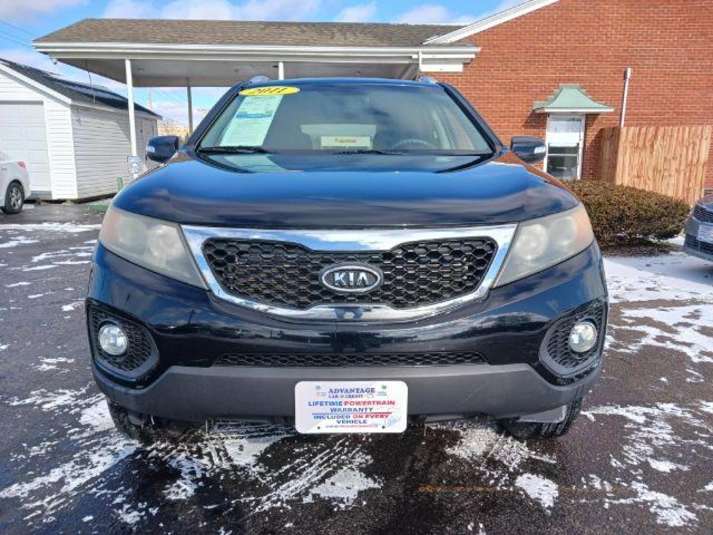 2011 Ebony Black Kia Sorento LX 2WD (5XYKT3A11BG) with an 2.4L L4 DOHC 16V engine, 6-Speed Automatic transmission, located at 1099 N County Rd 25A, OH, 45373, (937) 908-9800, 40.057079, -84.212883 - Photo#1