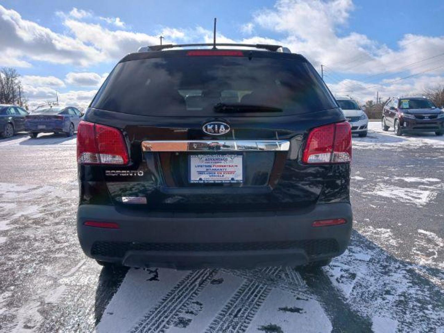 2011 Ebony Black Kia Sorento LX 2WD (5XYKT3A11BG) with an 2.4L L4 DOHC 16V engine, 6-Speed Automatic transmission, located at 1099 N County Rd 25A, OH, 45373, (937) 908-9800, 40.057079, -84.212883 - Photo#5