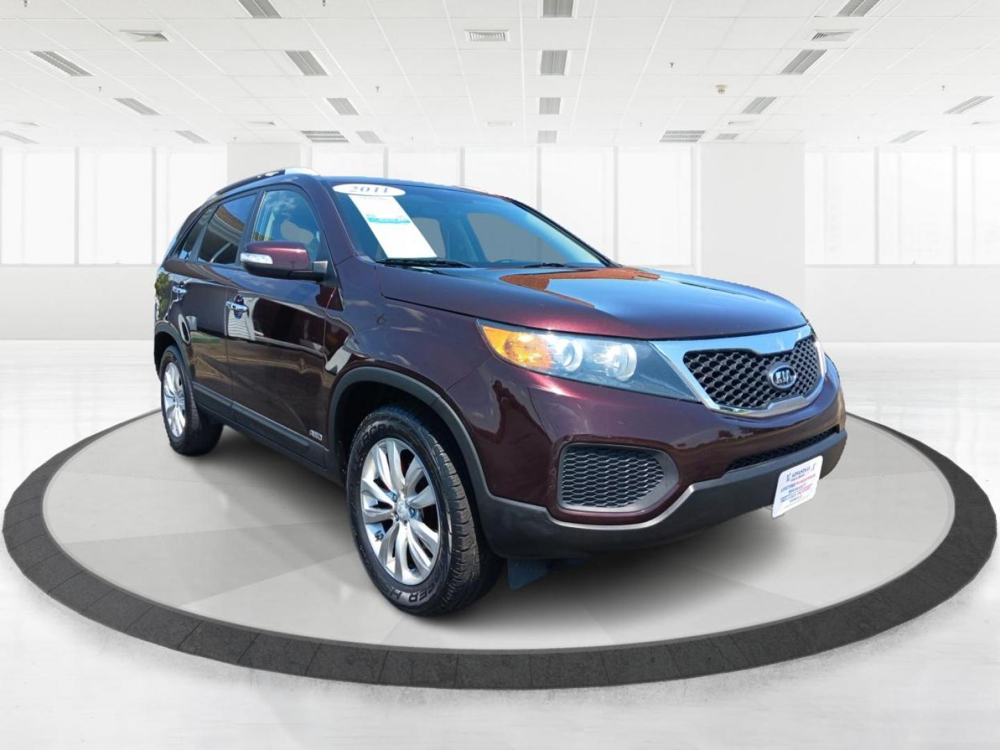 2011 Dark Cherry Kia Sorento LX 4WD (5XYKTDA22BG) with an 3.5L V6 DOHC 24V engine, 6-Speed Automatic transmission, located at 1230 East Main St, Xenia, OH, 45385, (937) 908-9800, 39.687321, -83.910294 - Photo#5