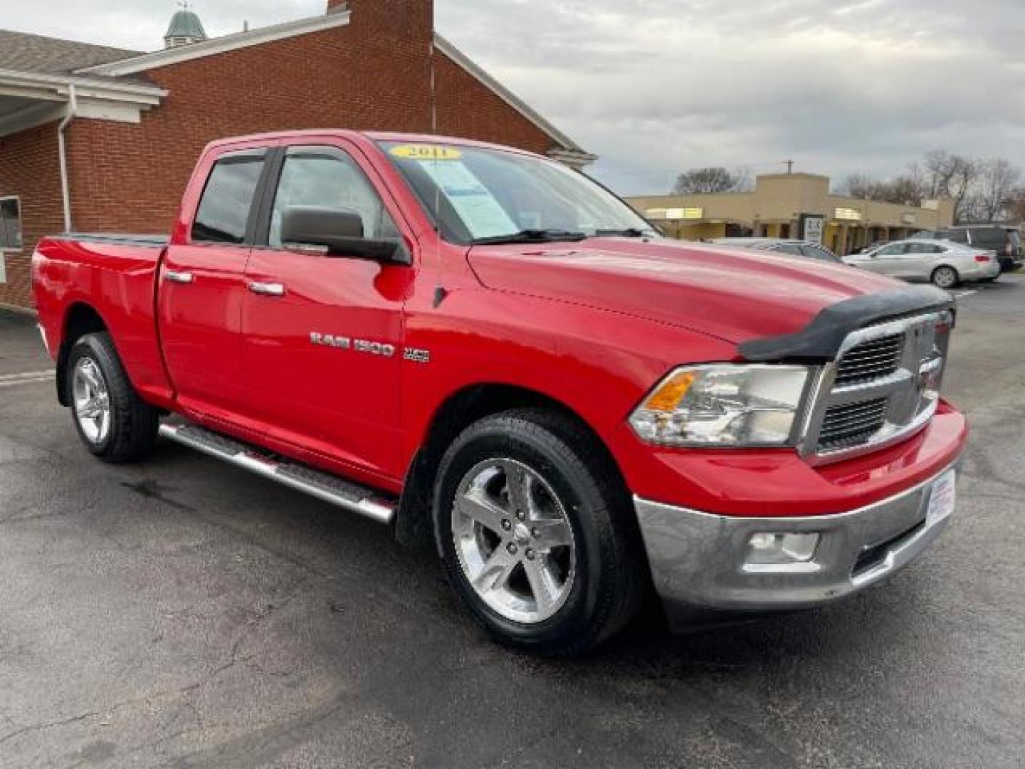 2011 Deep Cherry Red Crystal Pearl RAM 1500 ST Quad Cab 4WD (1D7RV1GT7BS) with an 5.7L V8 OHV 16V engine, 5-Speed Automatic transmission, located at 1951 S Dayton Lakeview Rd., New Carlisle, OH, 45344, (937) 908-9800, 39.890999, -84.050255 - Photo#0