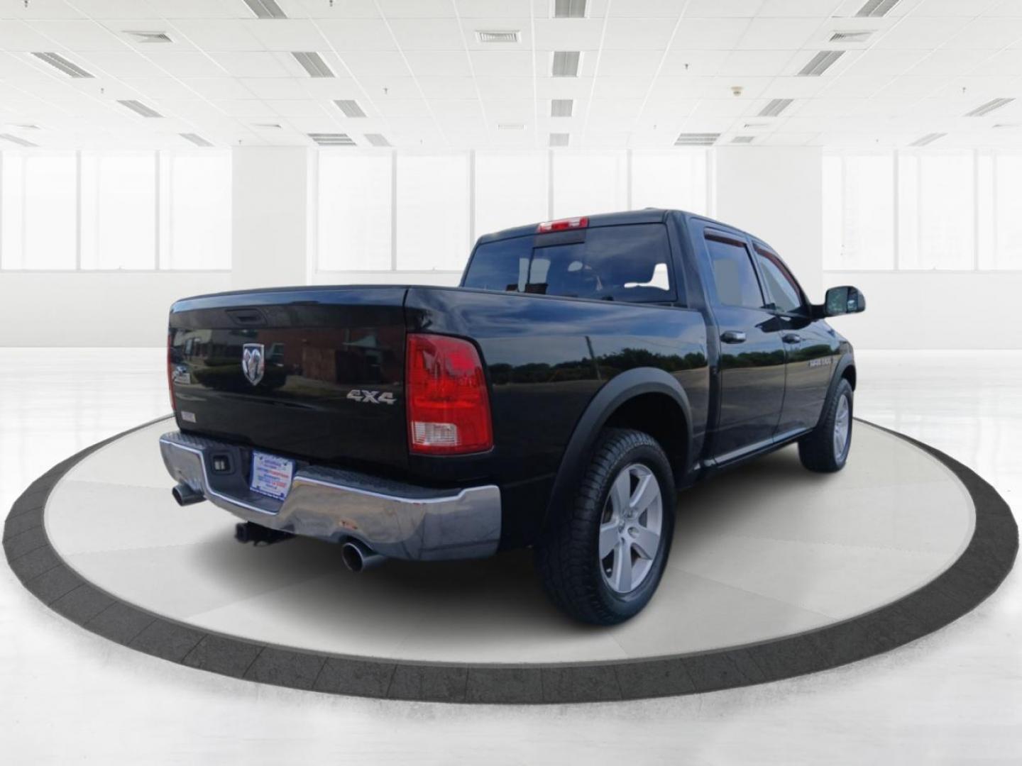 2011 Brilliant Black Crystal Pearl Dodge Ram 1500 ST Crew Cab 4WD (1D7RV1CT8BS) with an 5.7L V8 OHV 16V engine, 5-Speed Automatic transmission, located at 1099 N County Rd 25A, OH, 45373, (937) 908-9800, 40.057079, -84.212883 - Photo#2