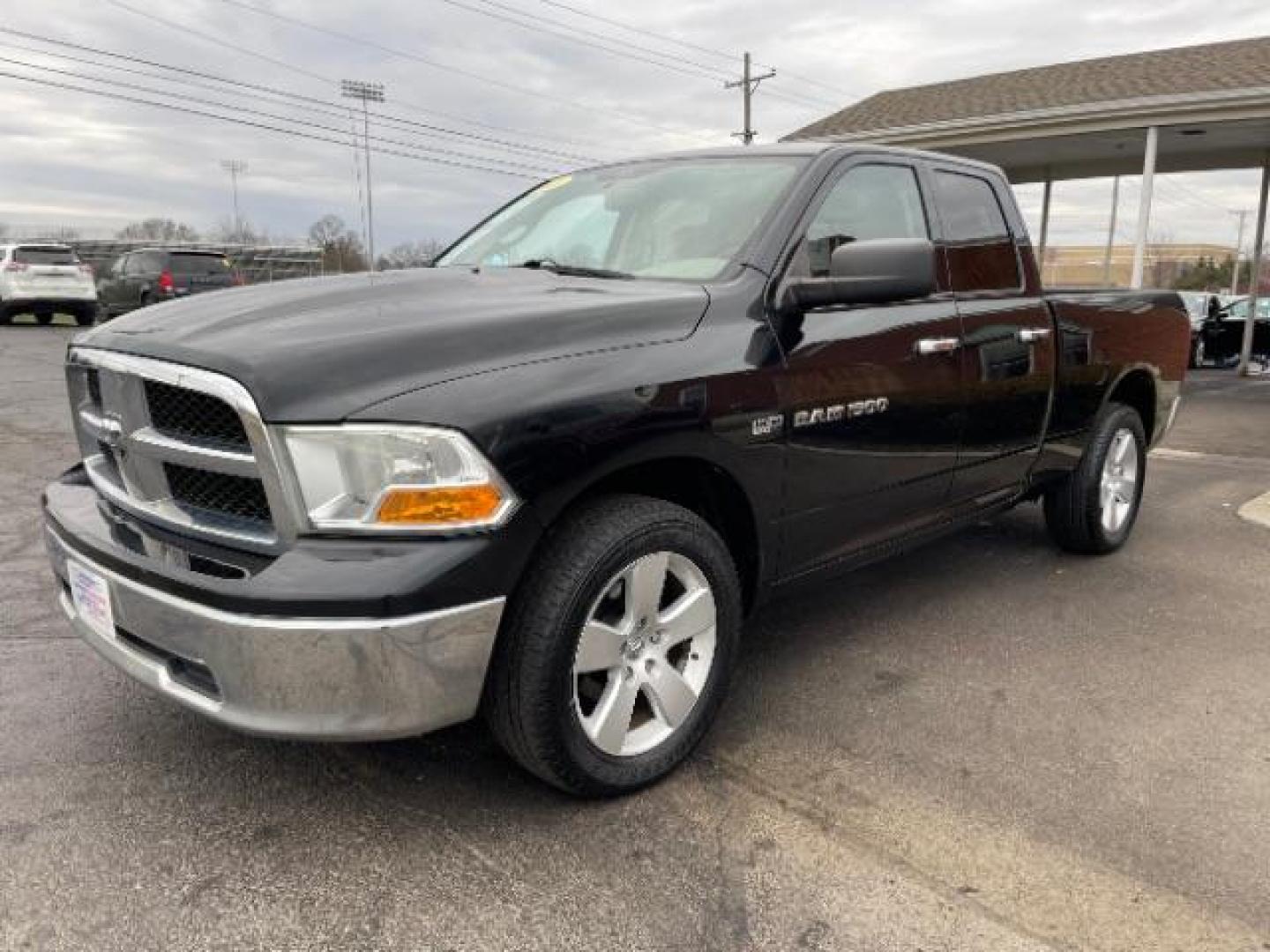 2011 Brilliant Black Crystal Pearl RAM 1500 ST Quad Cab 4WD (1D7RV1GT0BS) with an 5.7L V8 OHV 16V engine, 5-Speed Automatic transmission, located at 1230 East Main St, Xenia, OH, 45385, (937) 908-9800, 39.687321, -83.910294 - Photo#1