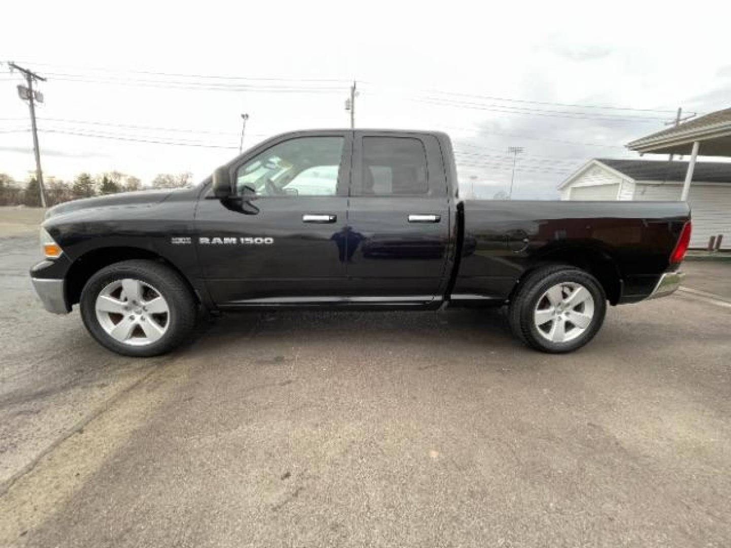 2011 Brilliant Black Crystal Pearl RAM 1500 ST Quad Cab 4WD (1D7RV1GT0BS) with an 5.7L V8 OHV 16V engine, 5-Speed Automatic transmission, located at 1230 East Main St, Xenia, OH, 45385, (937) 908-9800, 39.687321, -83.910294 - Photo#2