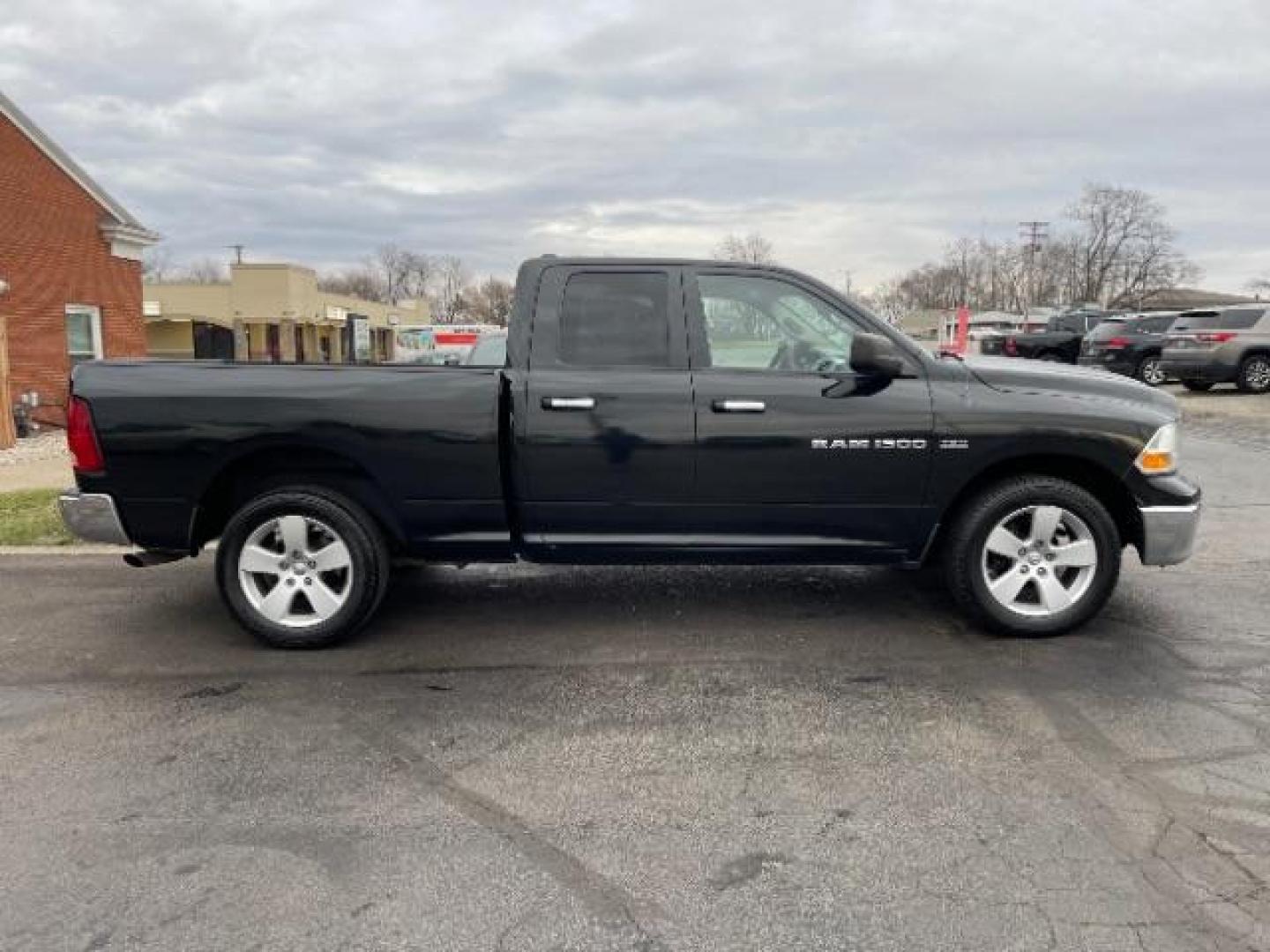 2011 Brilliant Black Crystal Pearl RAM 1500 ST Quad Cab 4WD (1D7RV1GT0BS) with an 5.7L V8 OHV 16V engine, 5-Speed Automatic transmission, located at 1230 East Main St, Xenia, OH, 45385, (937) 908-9800, 39.687321, -83.910294 - Photo#3