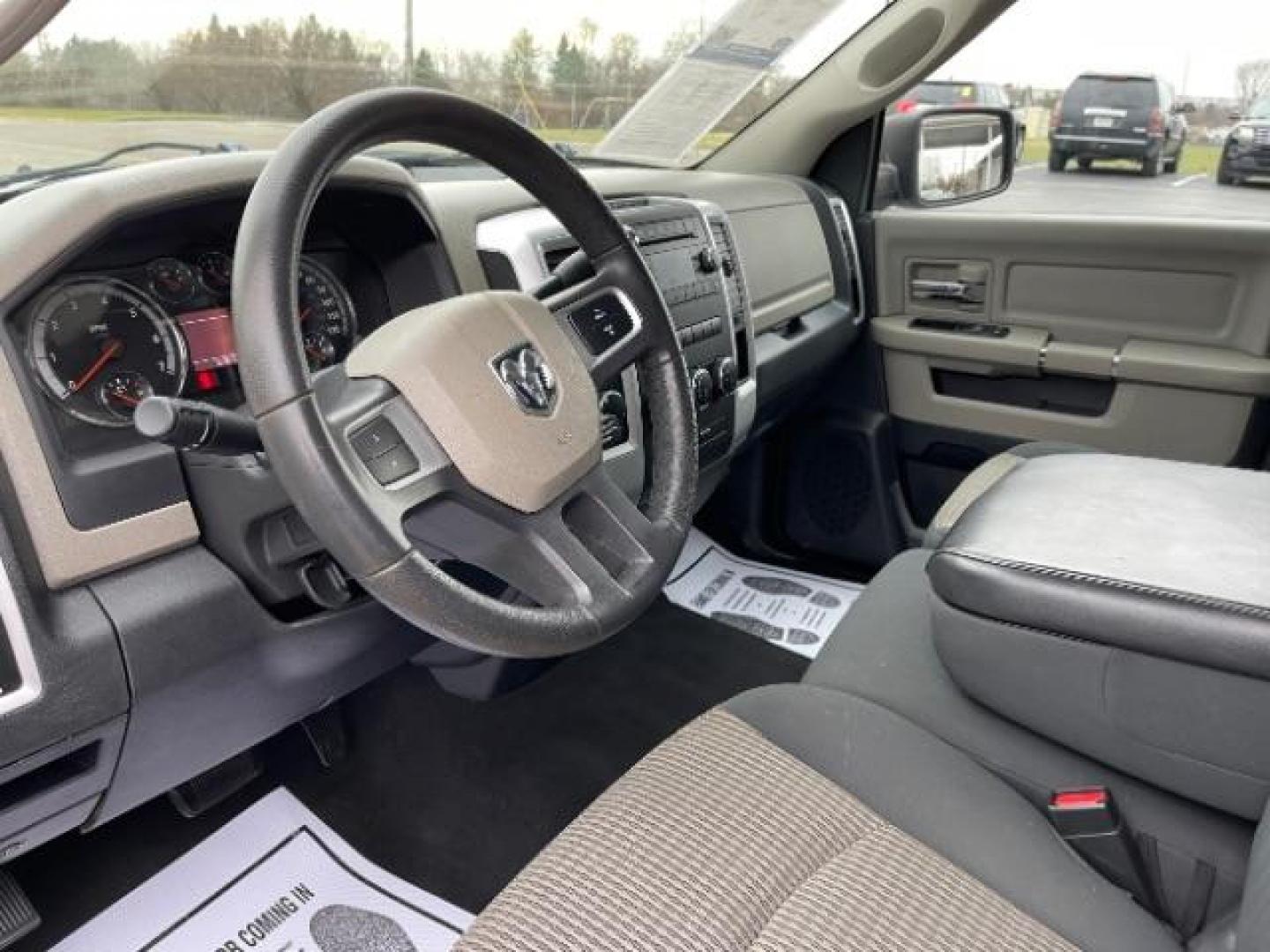 2011 Brilliant Black Crystal Pearl RAM 1500 ST Quad Cab 4WD (1D7RV1GT0BS) with an 5.7L V8 OHV 16V engine, 5-Speed Automatic transmission, located at 1230 East Main St, Xenia, OH, 45385, (937) 908-9800, 39.687321, -83.910294 - Photo#7