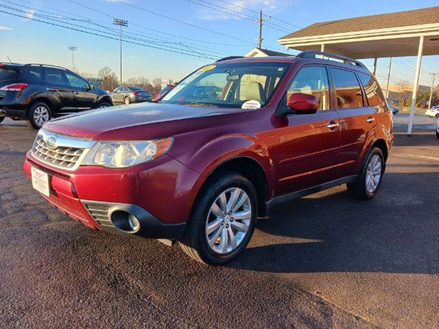 2011 Camellia Red Pearl Subaru Forester 2.5X Limited (JF2SHAEC2BH) with an 2.5L H4 SOHC 16V engine, 4-Speed Automatic transmission, located at 1230 East Main St, Xenia, OH, 45385, (937) 908-9800, 39.687321, -83.910294 - Photo#2