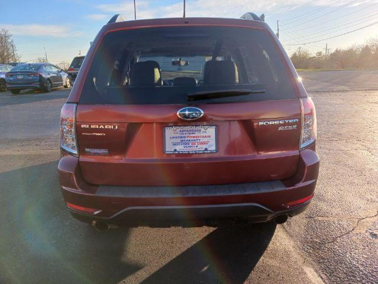 2011 Camellia Red Pearl Subaru Forester 2.5X Limited (JF2SHAEC2BH) with an 2.5L H4 SOHC 16V engine, 4-Speed Automatic transmission, located at 1230 East Main St, Xenia, OH, 45385, (937) 908-9800, 39.687321, -83.910294 - Photo#5