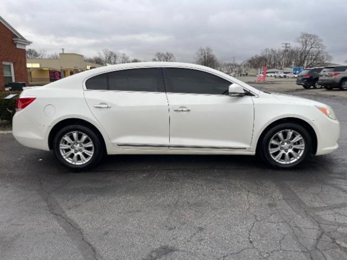 2012 Summit White Buick LaCrosse Leather Package (1G4GC5ER0CF) with an 2.4L L4 DOHC 16V engine, 6-Speed Automatic transmission, located at 1230 East Main St, Xenia, OH, 45385, (937) 908-9800, 39.687321, -83.910294 - Photo#5