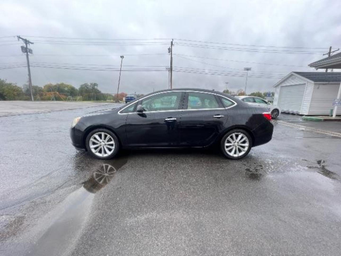 2012 Black Onyx Buick Verano Base (1G4PP5SK2C4) with an 2.4L L4 DOHC 16V FFV engine, 6-Speed Automatic transmission, located at 880 E. National Road, Vandalia, OH, 45377, (937) 908-9800, 39.892189, -84.181015 - Photo#3