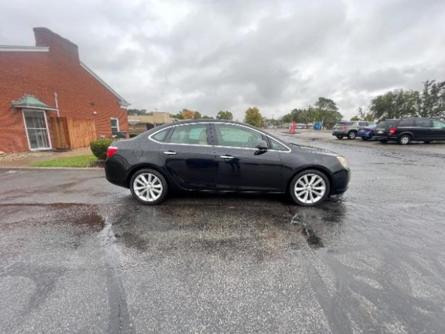 2012 Black Onyx Buick Verano Base (1G4PP5SK2C4) with an 2.4L L4 DOHC 16V FFV engine, 6-Speed Automatic transmission, located at 880 E. National Road, Vandalia, OH, 45377, (937) 908-9800, 39.892189, -84.181015 - Photo#5