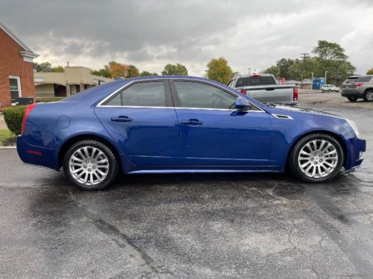 2012 Opulent Blue Metallic Cadillac CTS 3.6L Performance AWD (1G6DL5E37C0) with an 3.6L V6 DOHC 24V FFV engine, 6-Speed Automatic transmission, located at 1230 East Main St, Xenia, OH, 45385, (937) 908-9800, 39.687321, -83.910294 - Photo#3