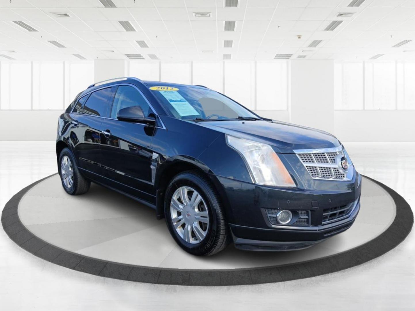 2012 Black Raven Cadillac SRX Luxury AWD (3GYFNDE34CS) with an 3.6L V6 DOHC 24V FFV engine, 6-Speed Automatic transmission, located at 1099 N County Rd 25A, OH, 45373, (937) 908-9800, 40.057079, -84.212883 - Photo#0