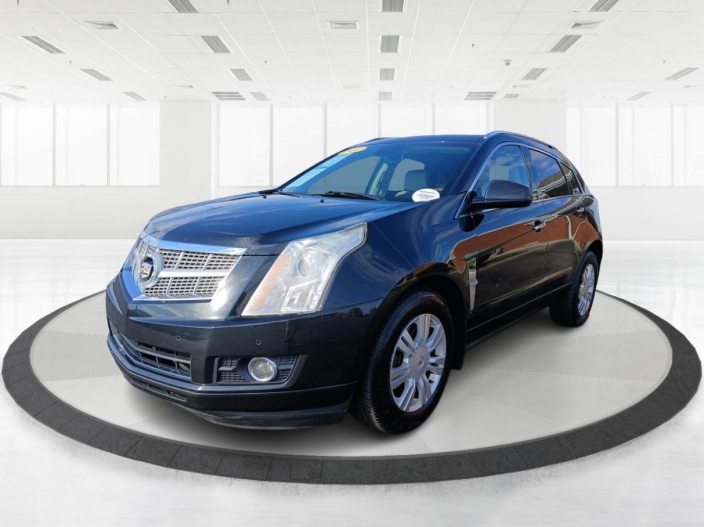 2012 Black Raven Cadillac SRX Luxury AWD (3GYFNDE34CS) with an 3.6L V6 DOHC 24V FFV engine, 6-Speed Automatic transmission, located at 1099 N County Rd 25A, OH, 45373, (937) 908-9800, 40.057079, -84.212883 - Photo#7