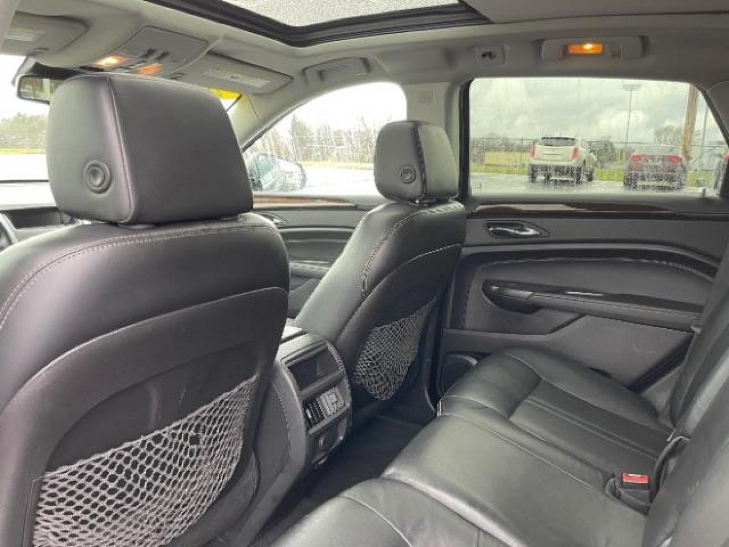 2012 Black Raven Cadillac SRX Luxury AWD (3GYFNDE35CS) with an 3.6L V6 DOHC 24V FFV engine, 6-Speed Automatic transmission, located at 1951 S Dayton Lakeview Rd., New Carlisle, OH, 45344, (937) 908-9800, 39.890999, -84.050255 - Photo#10