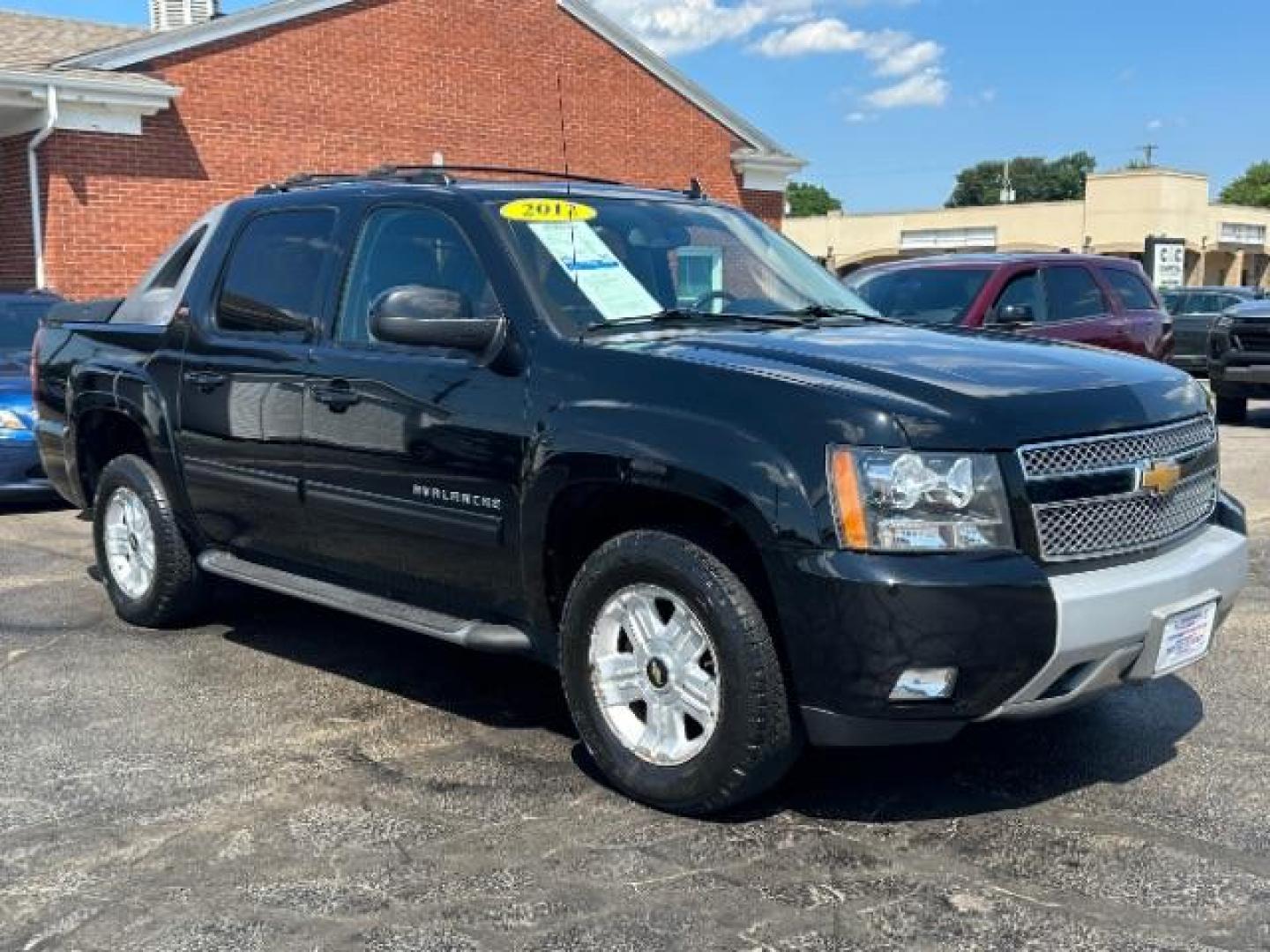 2012 Black Chevrolet Avalanche LT 4WD (3GNTKFE73CG) with an 5.3L V8 OHV 16V FFV engine, 4-Speed Automatic transmission, located at 1951 S Dayton Lakeview Rd., New Carlisle, OH, 45344, (937) 908-9800, 39.890999, -84.050255 - Photo#0