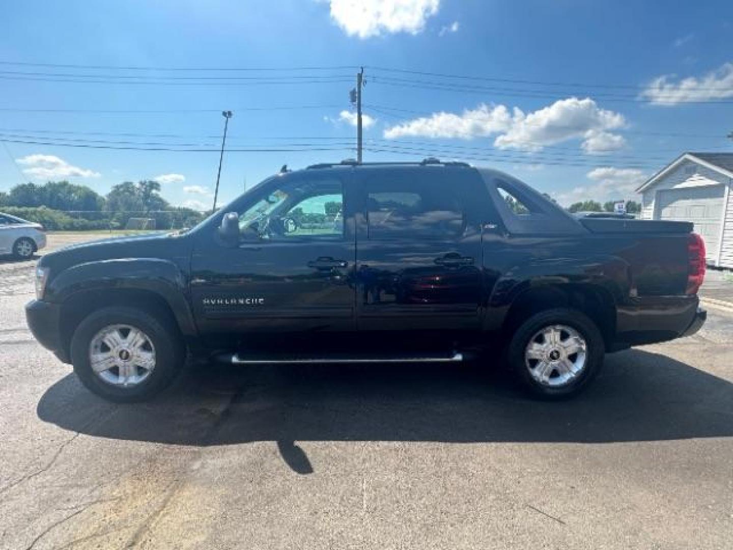 2012 Black Chevrolet Avalanche LT 4WD (3GNTKFE73CG) with an 5.3L V8 OHV 16V FFV engine, 4-Speed Automatic transmission, located at 1951 S Dayton Lakeview Rd., New Carlisle, OH, 45344, (937) 908-9800, 39.890999, -84.050255 - Photo#3