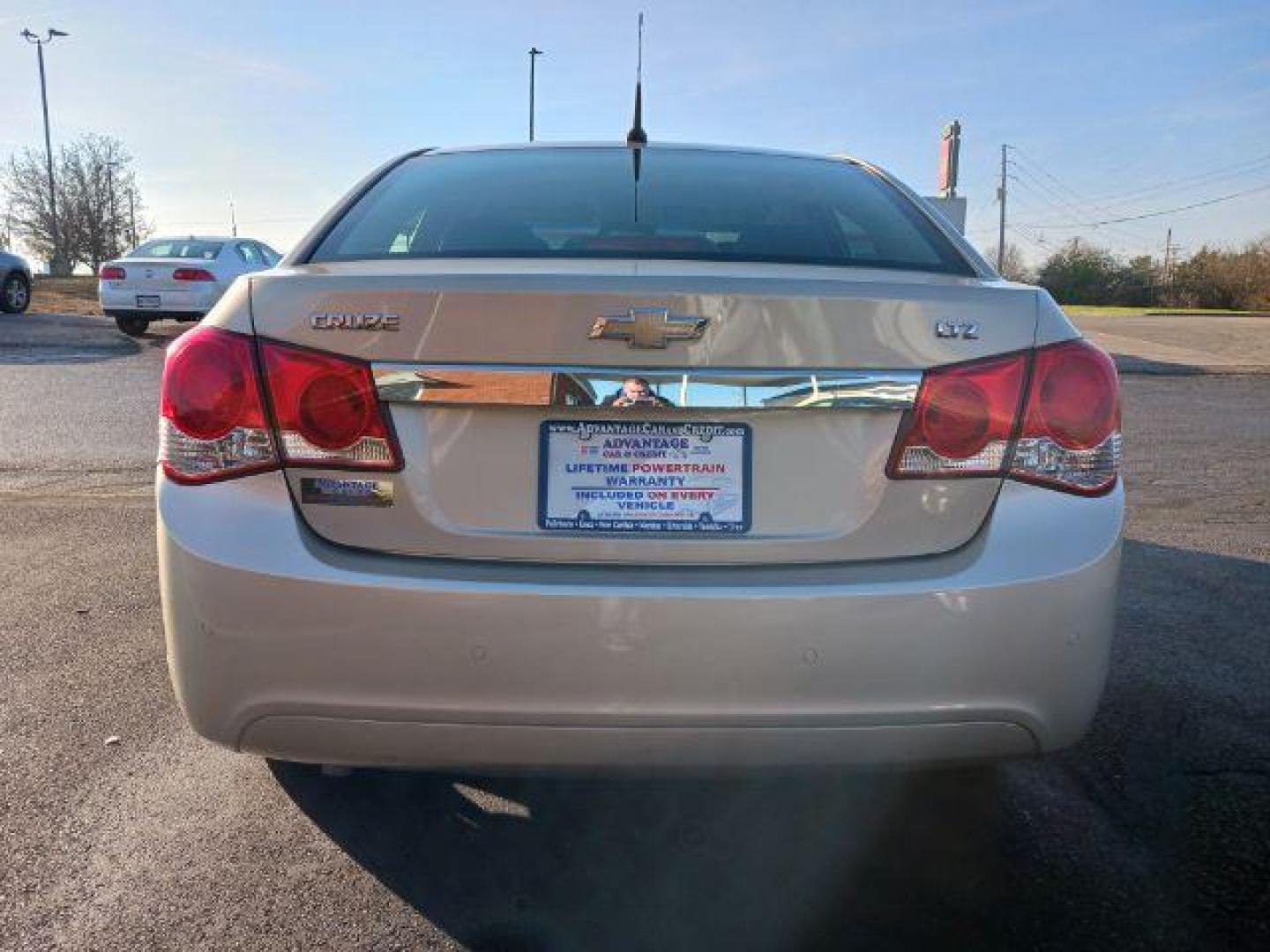 2012 Gold Mist Metallic Chevrolet Cruze LTZ (1G1PH5SC3C7) with an 1.4L L4 DOHC 16V TURBO engine, 6-Speed Automatic transmission, located at 880 E. National Road, Vandalia, OH, 45377, (937) 908-9800, 39.892189, -84.181015 - Photo#5