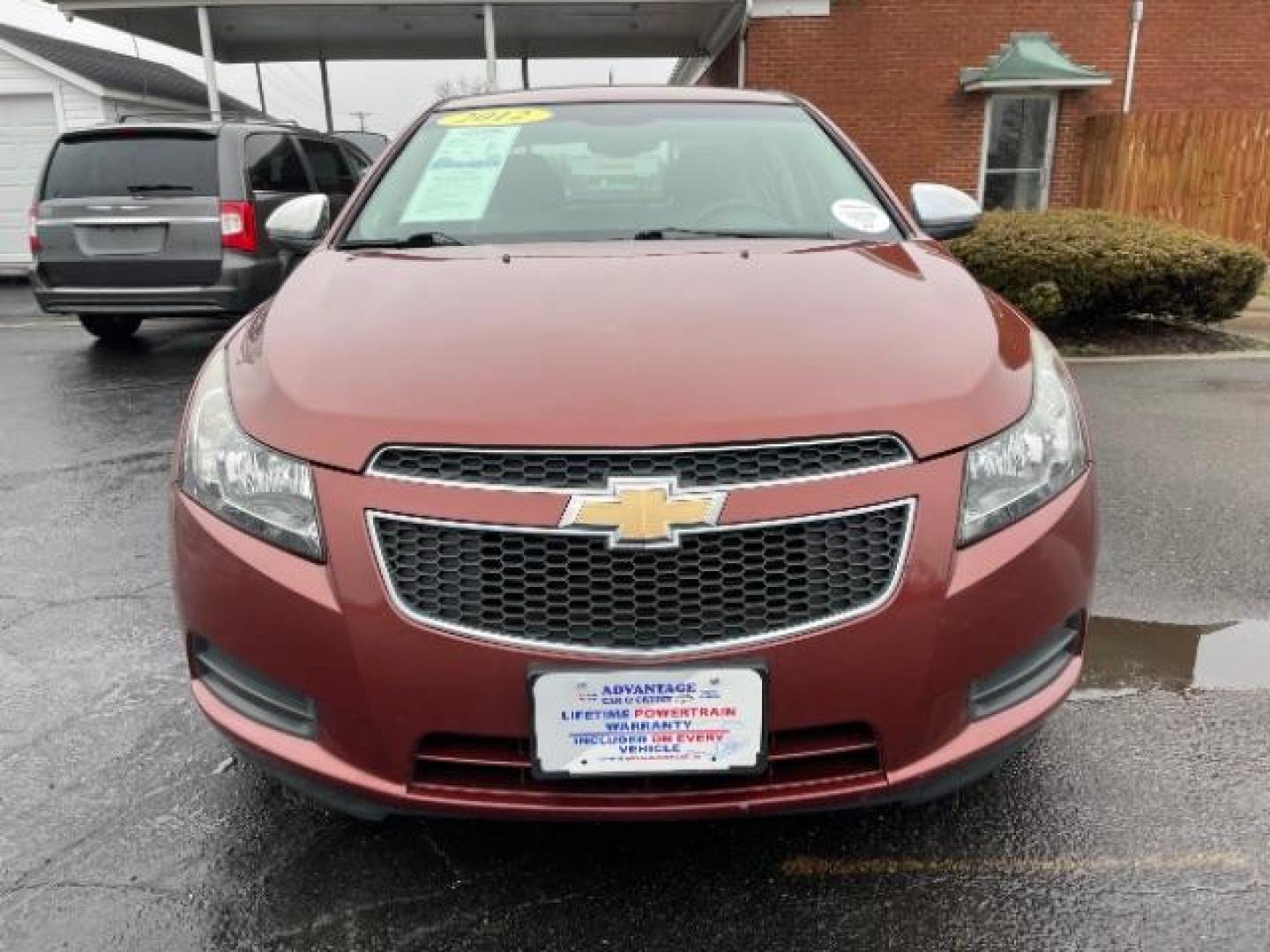 2012 Orange Chevrolet Cruze 2LS (1G1PC5SH1C7) with an 1.8L L4 DOHC 16V FFV engine, 6-Speed Automatic transmission, located at 880 E. National Road, Vandalia, OH, 45377, (937) 908-9800, 39.892189, -84.181015 - Photo#2