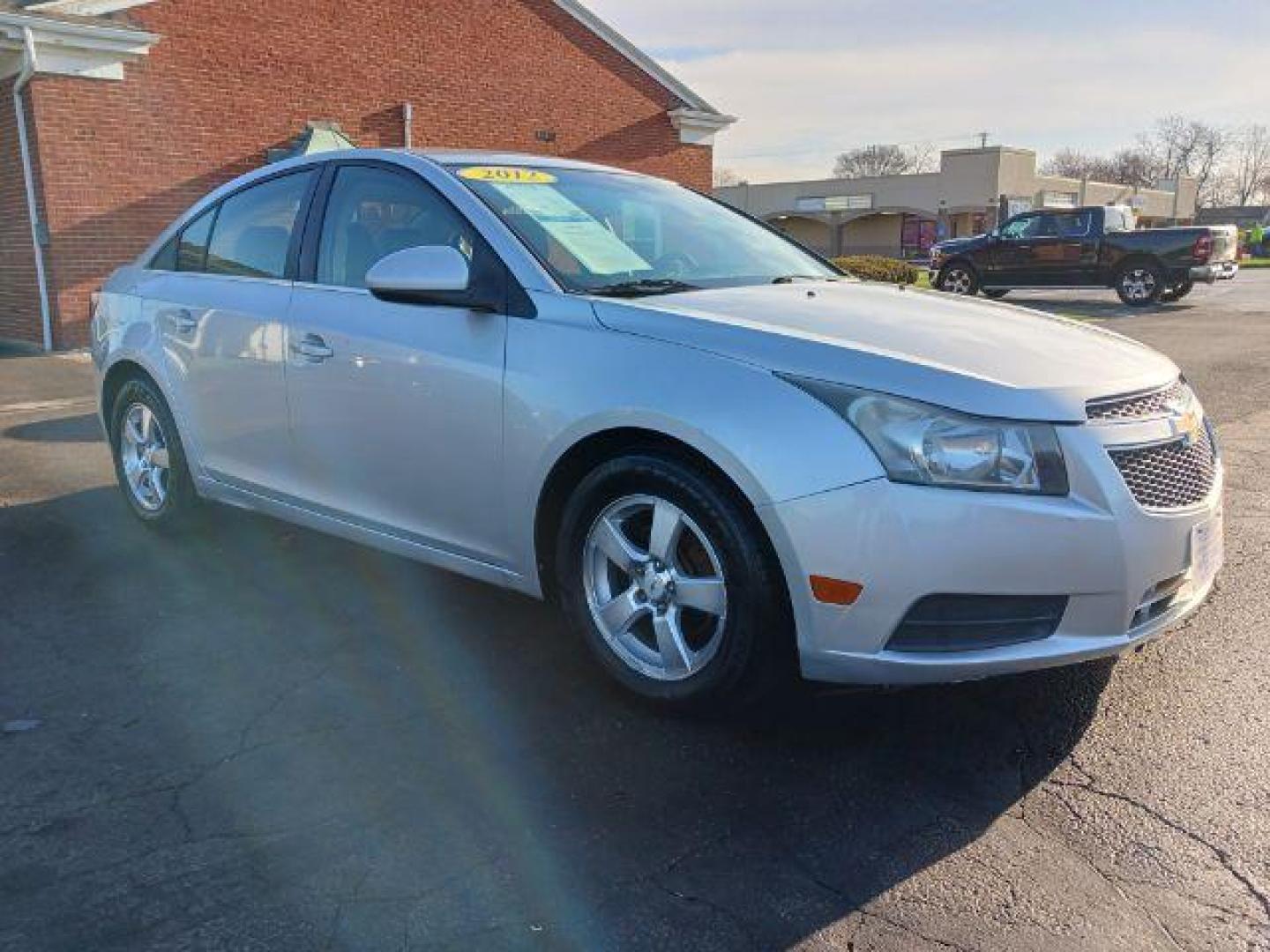 2012 Silver Ice Metallic Chevrolet Cruze 1LT (1G1PF5SC8C7) with an 1.4L L4 DOHC 16V TURBO engine, 6-Speed Automatic transmission, located at 1099 N County Rd 25A, OH, 45373, (937) 908-9800, 40.057079, -84.212883 - Photo#0