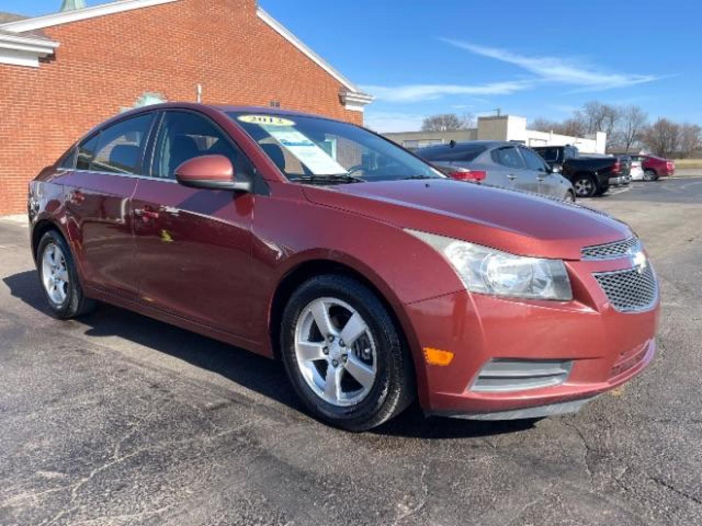 2012 Orange Chevrolet Cruze 1LT (1G1PF5SC6C7) with an 1.4L L4 DOHC 16V TURBO engine, 6-Speed Automatic transmission, located at 880 E. National Road, Vandalia, OH, 45377, (937) 908-9800, 39.892189, -84.181015 - Photo#0