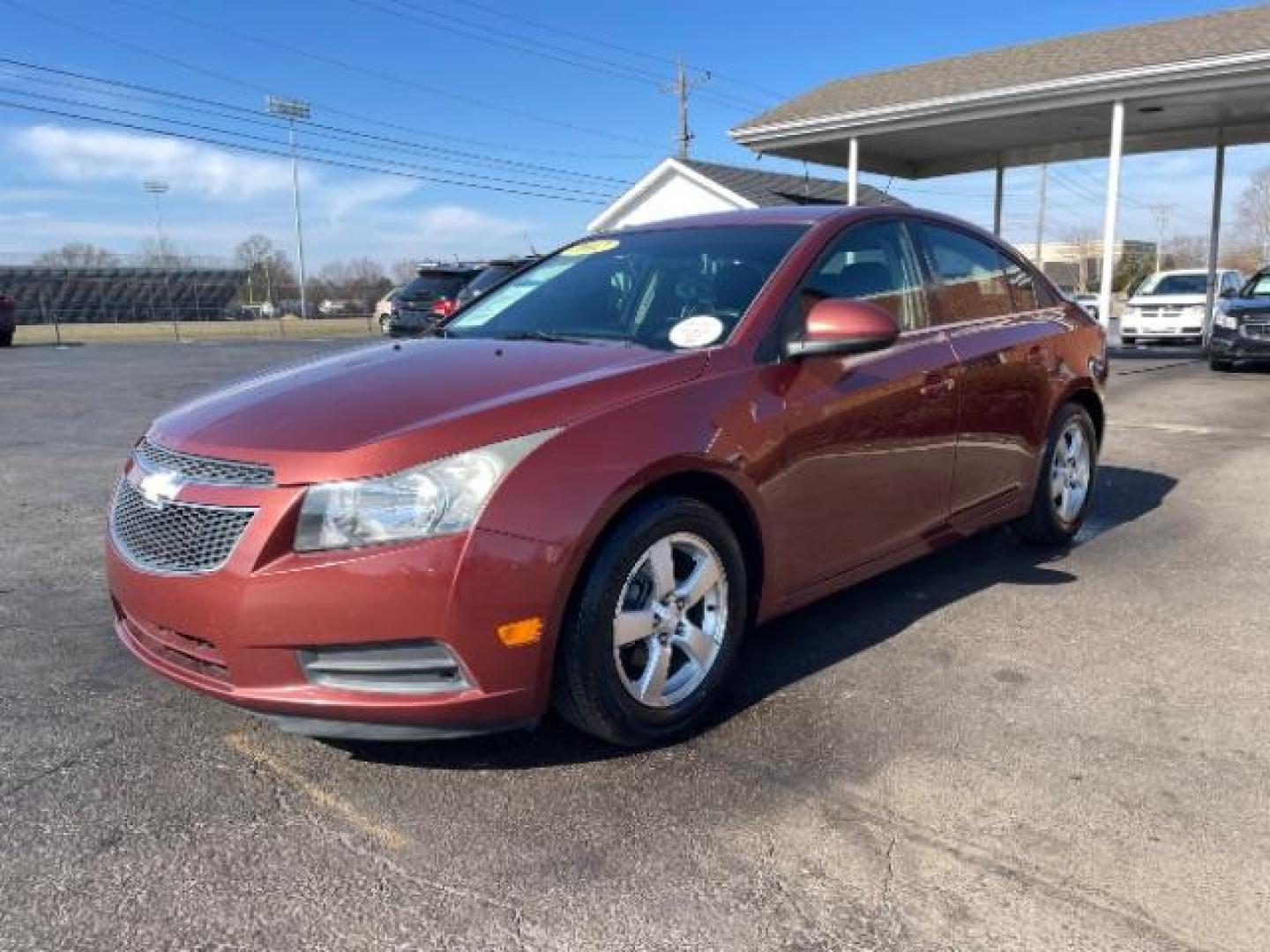 2012 Orange Chevrolet Cruze 1LT (1G1PF5SC6C7) with an 1.4L L4 DOHC 16V TURBO engine, 6-Speed Automatic transmission, located at 880 E. National Road, Vandalia, OH, 45377, (937) 908-9800, 39.892189, -84.181015 - Photo#1