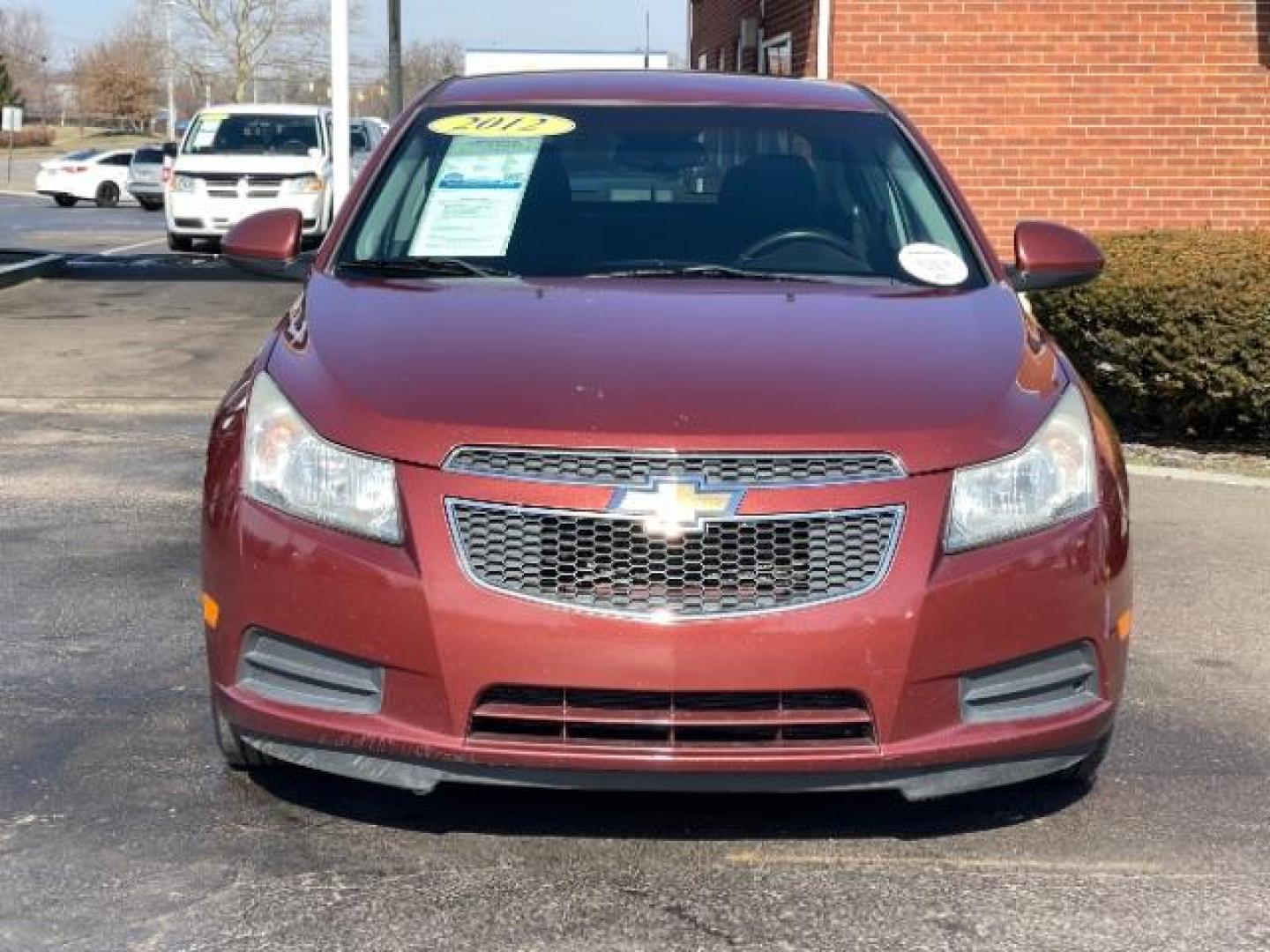 2012 Orange Chevrolet Cruze 1LT (1G1PF5SC6C7) with an 1.4L L4 DOHC 16V TURBO engine, 6-Speed Automatic transmission, located at 880 E. National Road, Vandalia, OH, 45377, (937) 908-9800, 39.892189, -84.181015 - Photo#4