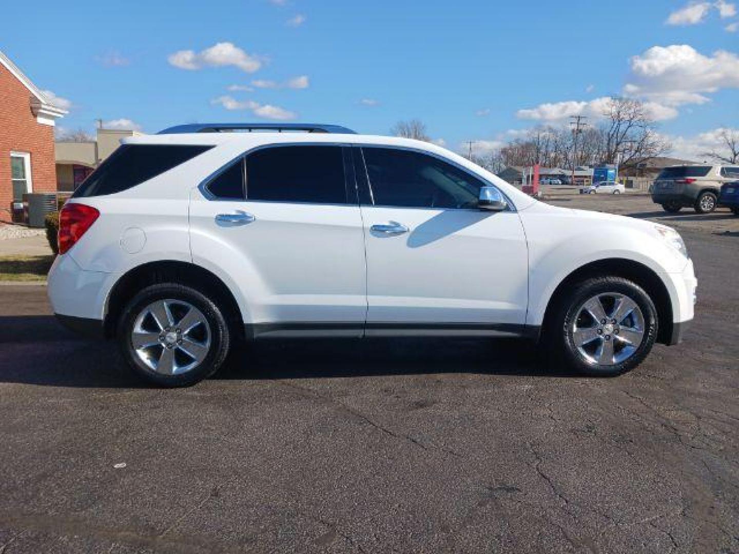 2012 Summit White Chevrolet Equinox LTZ 2WD (2GNALFEK9C6) with an 2.4L L4 DOHC 16V engine, 6-Speed Automatic transmission, located at 401 Woodman Dr, Riverside, OH, 45431, (937) 908-9800, 39.763779, -84.122063 - Photo#4