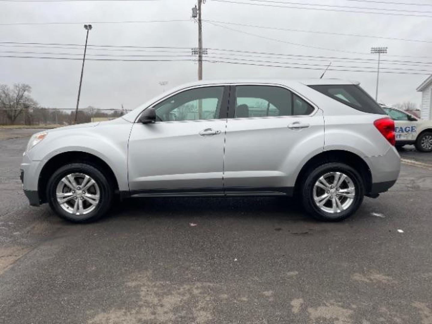 2012 Silver Ice Metallic Chevrolet Equinox LS 2WD (2GNALBEK4C1) with an 2.4L L4 DOHC 16V engine, 6-Speed Automatic transmission, located at 1230 East Main St, Xenia, OH, 45385, (937) 908-9800, 39.687321, -83.910294 - Photo#2