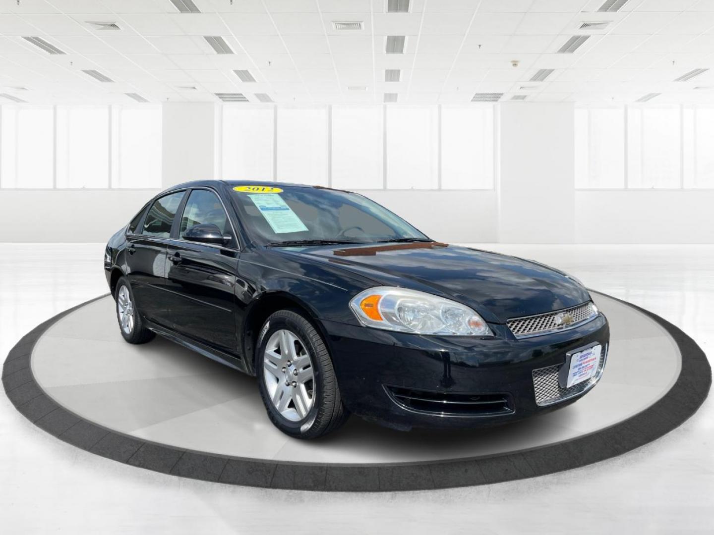 2012 Black Chevrolet Impala LT (2G1WB5E33C1) with an 3.6L V6 DOHC 16V FFV engine, 6-Speed Automatic transmission, located at 1184 Kauffman Ave, Fairborn, OH, 45324, (937) 908-9800, 39.807365, -84.029114 - Photo#0