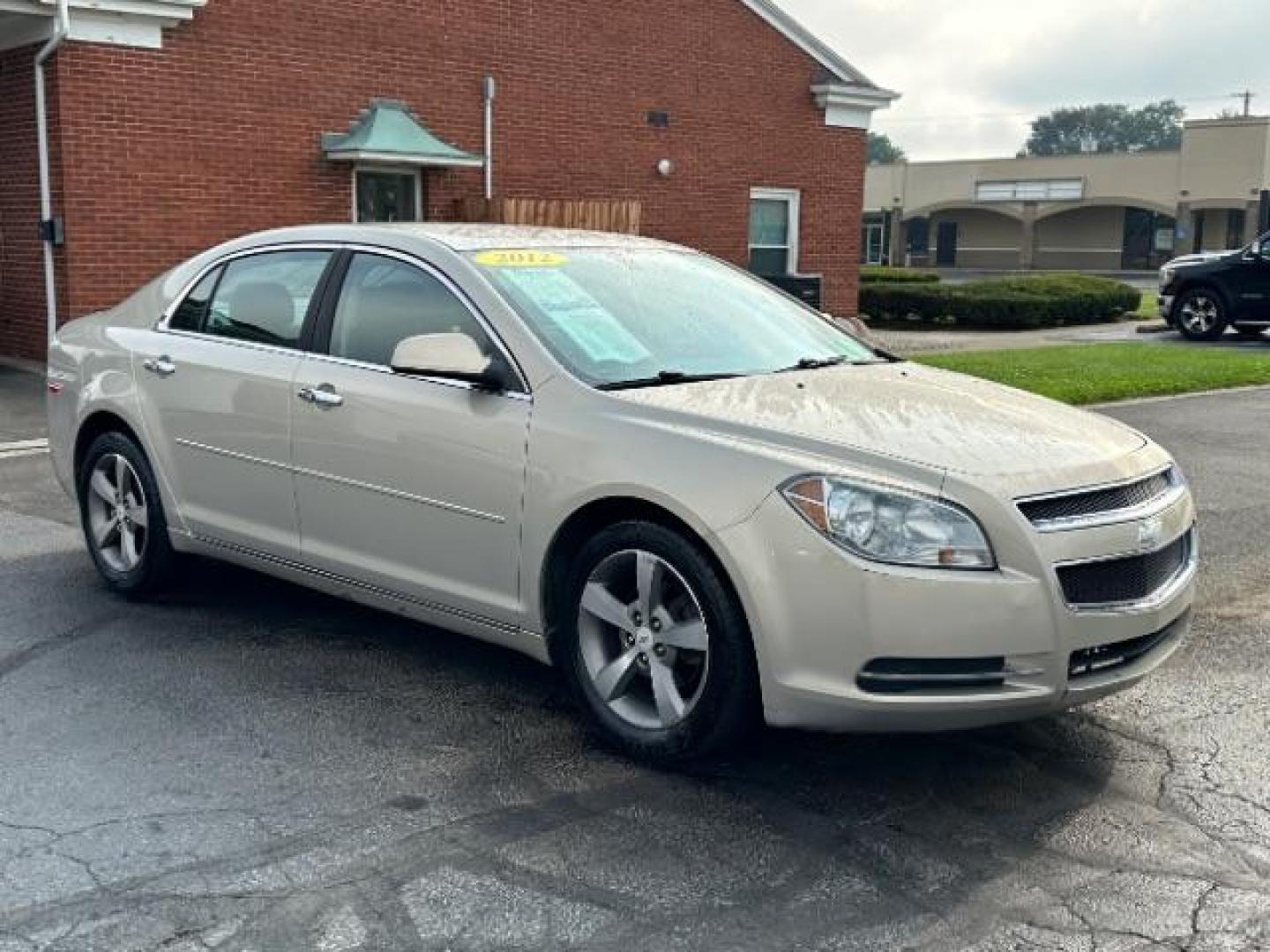 2012 Gold Mist Metallic Chevrolet Malibu 1LT (1G1ZC5E07CF) with an 2.4L L4 DOHC 16V engine, 6-Speed Automatic transmission, located at 1184 Kauffman Ave, Fairborn, OH, 45324, (937) 908-9800, 39.807365, -84.029114 - Photo#0