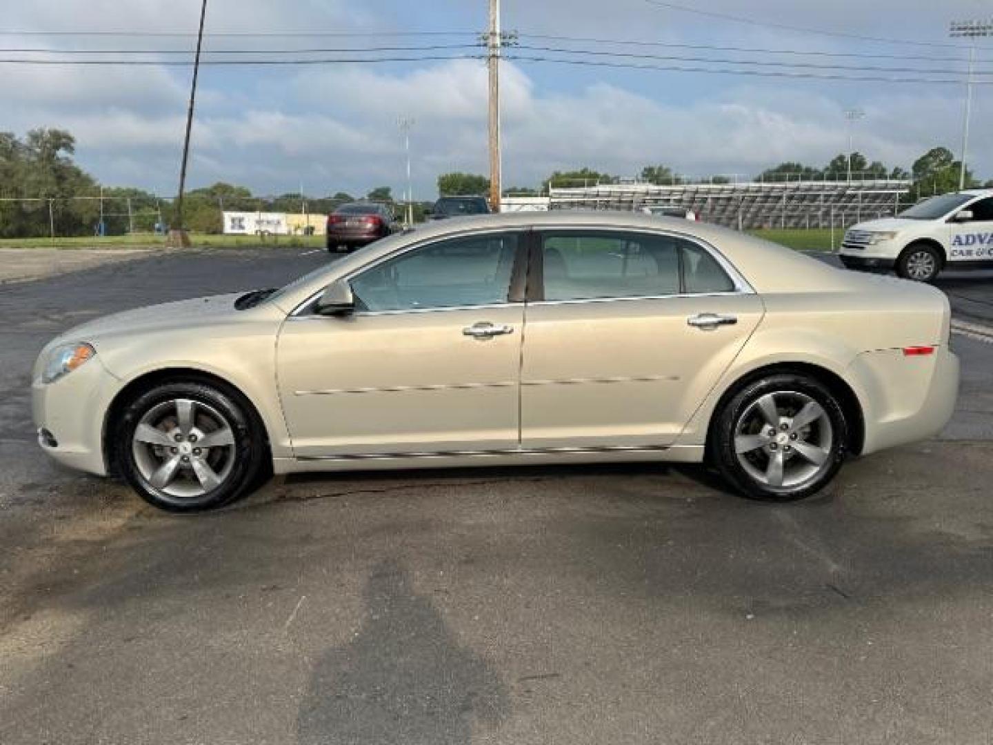 2012 Gold Mist Metallic Chevrolet Malibu 1LT (1G1ZC5E07CF) with an 2.4L L4 DOHC 16V engine, 6-Speed Automatic transmission, located at 1184 Kauffman Ave, Fairborn, OH, 45324, (937) 908-9800, 39.807365, -84.029114 - Photo#2