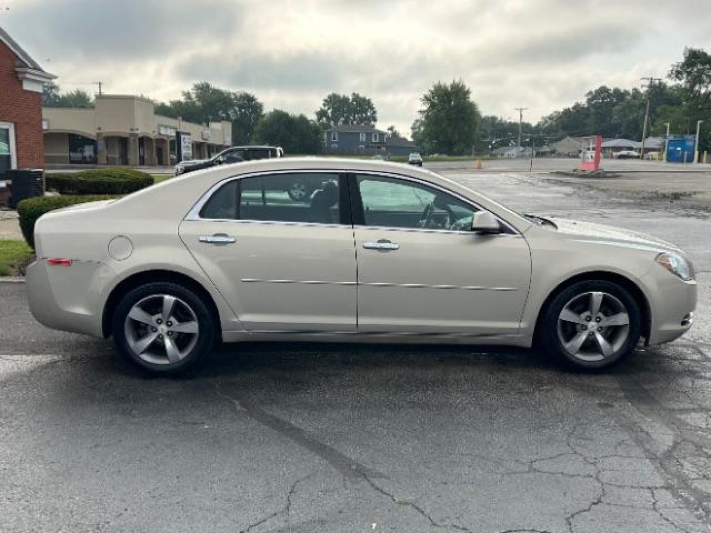 2012 Gold Mist Metallic Chevrolet Malibu 1LT (1G1ZC5E07CF) with an 2.4L L4 DOHC 16V engine, 6-Speed Automatic transmission, located at 1184 Kauffman Ave, Fairborn, OH, 45324, (937) 908-9800, 39.807365, -84.029114 - Photo#5