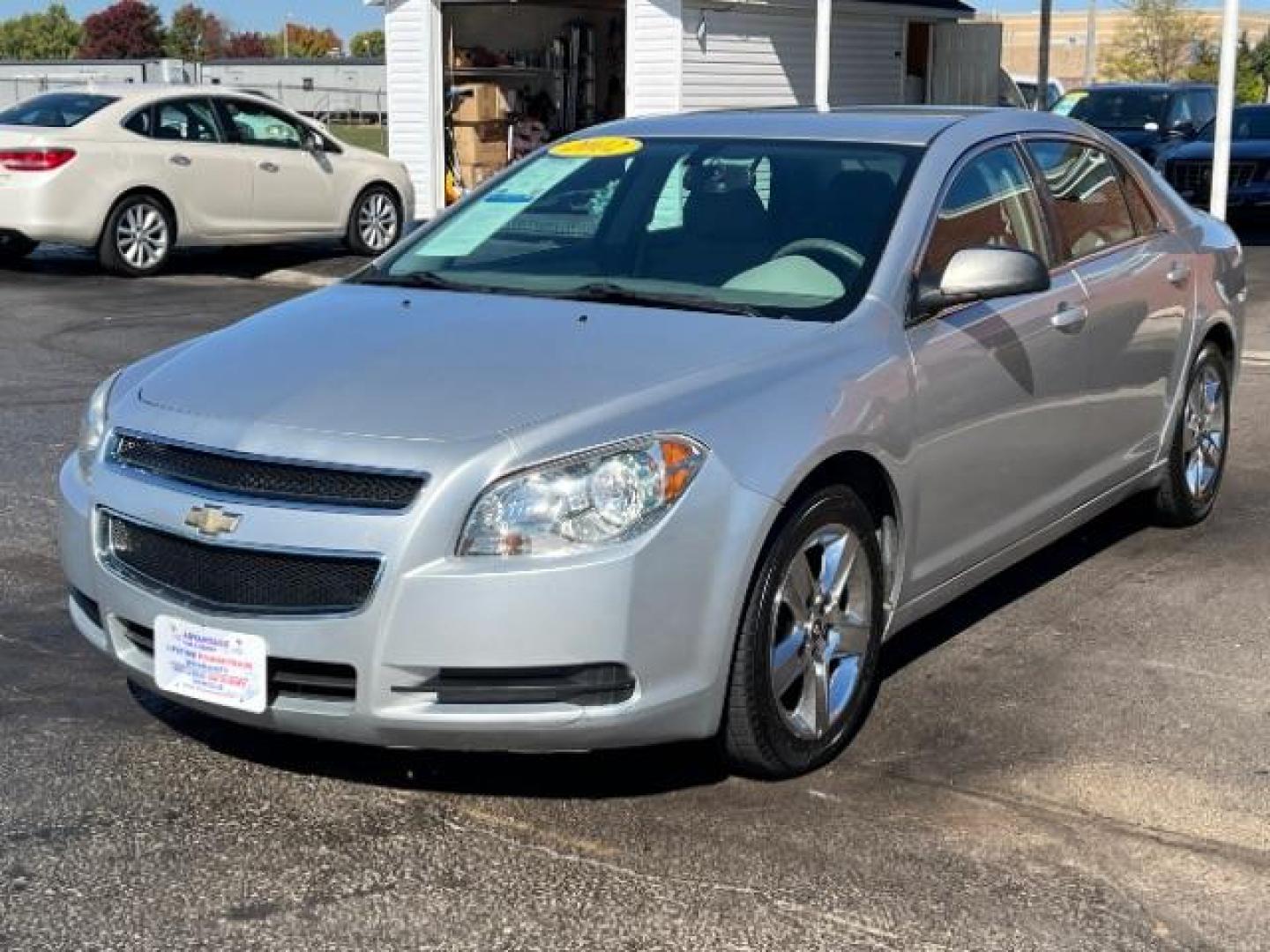 2012 Silver Ice Metallic Chevrolet Malibu LS (1G1ZB5E06CF) with an 2.4L L4 DOHC 16V engine, 6-Speed Automatic transmission, located at 1099 N County Rd 25A, OH, 45373, (937) 908-9800, 40.057079, -84.212883 - Photo#2