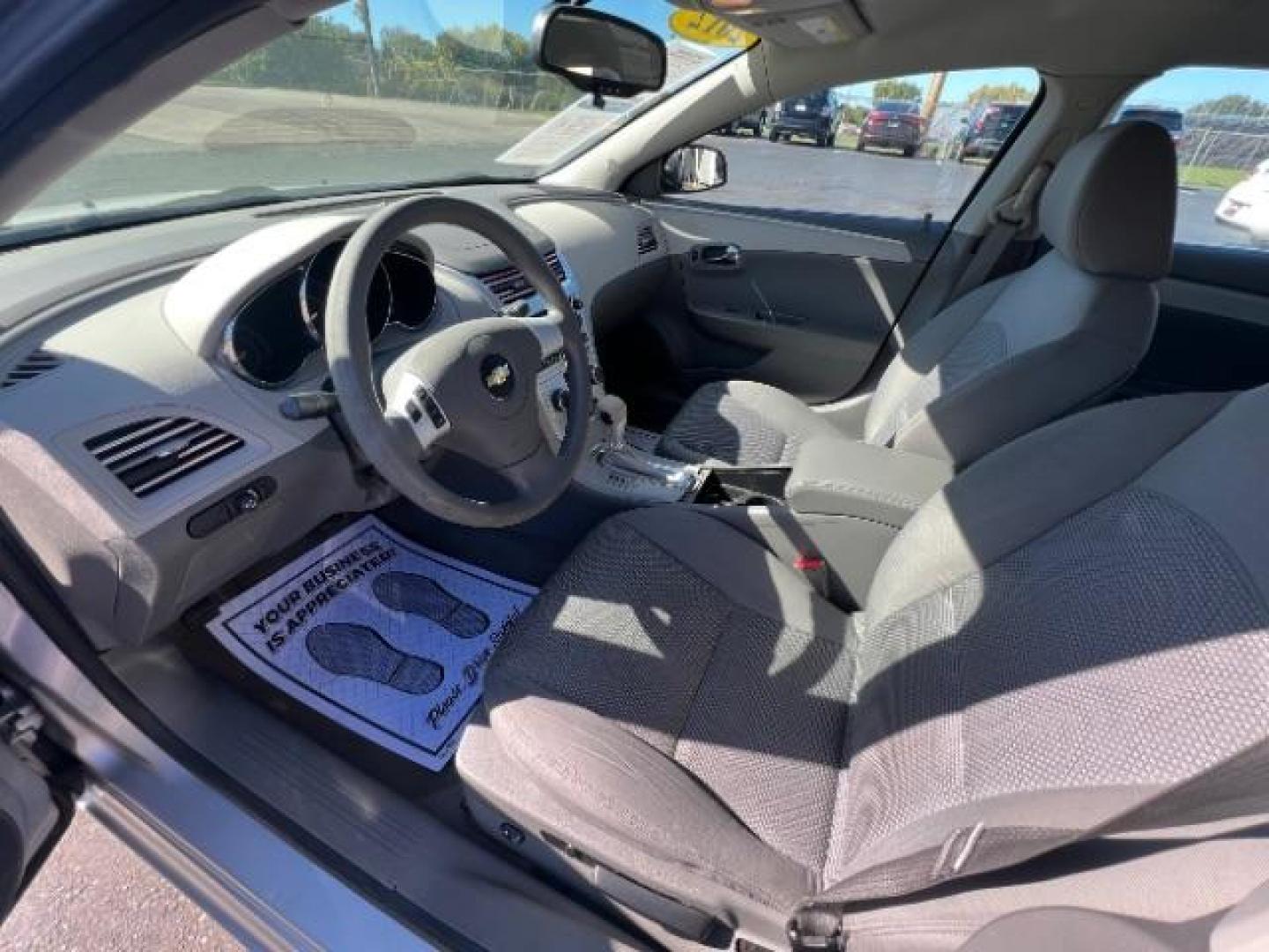 2012 Silver Ice Metallic Chevrolet Malibu LS (1G1ZB5E06CF) with an 2.4L L4 DOHC 16V engine, 6-Speed Automatic transmission, located at 1099 N County Rd 25A, OH, 45373, (937) 908-9800, 40.057079, -84.212883 - Photo#6