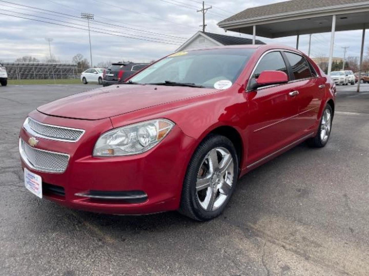 2012 Red Chevrolet Malibu 1LT (1G1ZC5E0XCF) with an 2.4L L4 DOHC 16V engine, 6-Speed Automatic transmission, located at 401 Woodman Dr, Riverside, OH, 45431, (937) 908-9800, 39.763779, -84.122063 - Photo#1